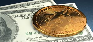 Moneta kryptowaluty Bitcoin i banknoty USD